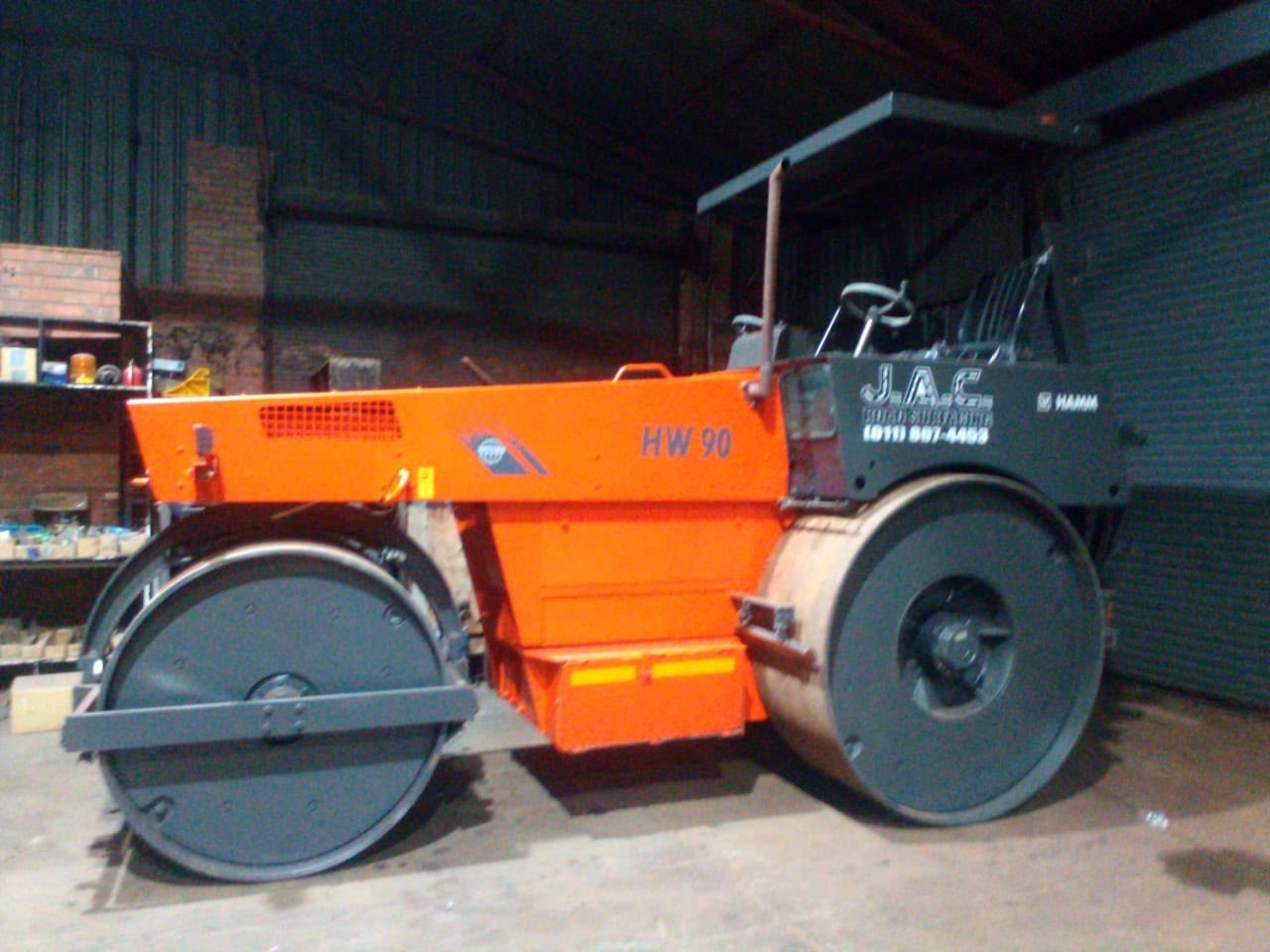 Hamm compactor resprayed in orange