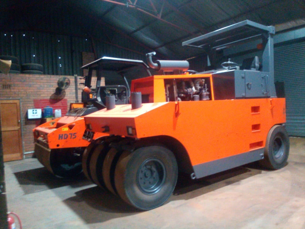 Vibratory roller — full respray in orange